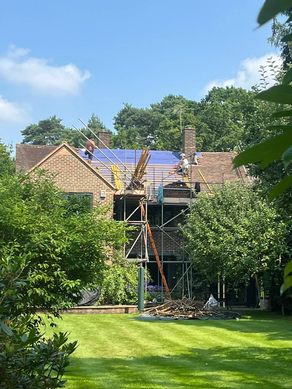 Scaffolding up for a re-roof at a house in Berkshire